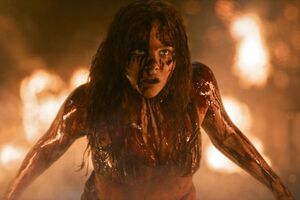 Bloody and burning Chloe Grace Moretz in Carrie