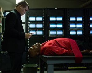 Samuel L. Jackson on the table in red, Oldboy