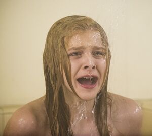 Carrie screams while taking shower