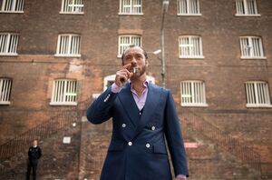 Jude Law having a smoke as Dom Hemingway