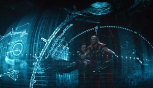 Thor and Loki fly around in futuristic blue ship thingy