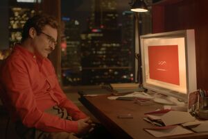 Joaquin Phoenix and his computer Samantha, voiced by Scarlet