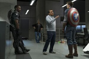 Chris Evans and director, Anthony Russo, talking it over.