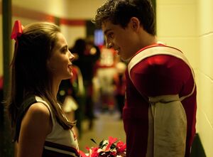 Katherine Hughes and Travis Tope as cheerleader and football