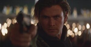 Chris Hemsworth gun close-up as Nicholas Hathaway