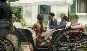 Chiwetel Ejiofor as a free Solomon Northup with his children