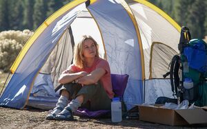 Reese Witherspoon in front of her tent, retro sandals and so