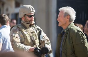 Bradley Cooper and Clint Eastwood have a chat on the set of 