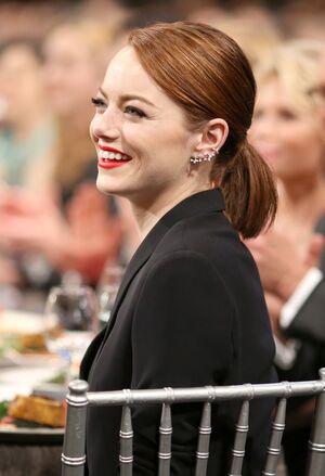 Emma Stone smiles from her SAG Awards table