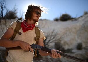 Garrett Hedlund with His Gun