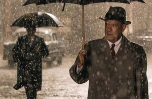 Tom Hanks on the street in the rain in Steven Spielberg's sp
