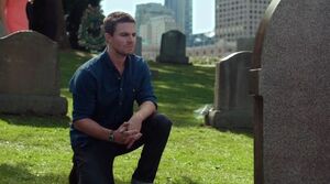 Oliver Queen at Tommy Merlyn's grave