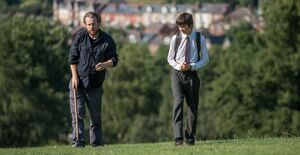 Rafe Spall and Asa Butterfield hang around