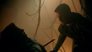 Oliver Queen tries to save dying Tommy Merlyn in the Undertaking