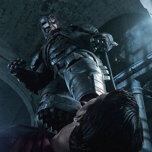 Batman puts his foot to Superman's throat in new image