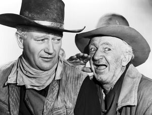 John Wayne and Walter Brennan