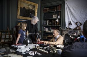 Michael Haneke directing on the set of Happy End