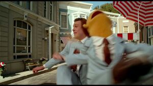 The Muppets sing Life's A Happy Song and Jason Segel kicks Walter off screen